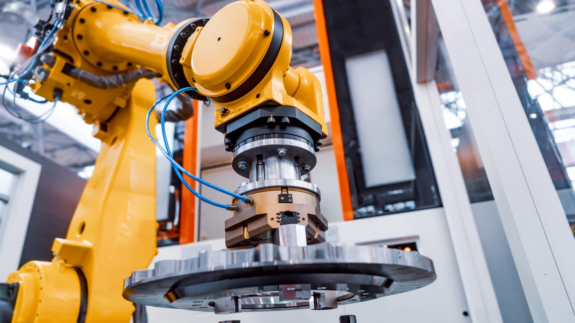 Robotic arm working in a modern automated factory